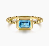 Gabriel & Co 14K Yellow Gold Emerald Cut Blue Topaz Bujukan Promise Ring